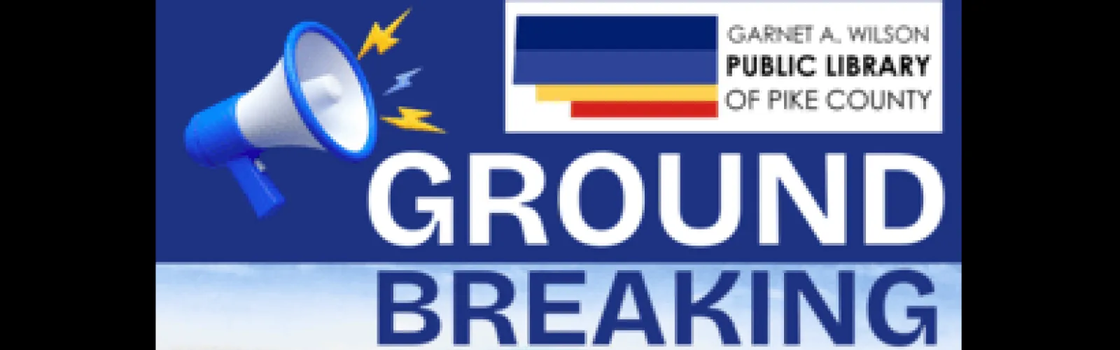 Blue megaphone announcing ground breaking.